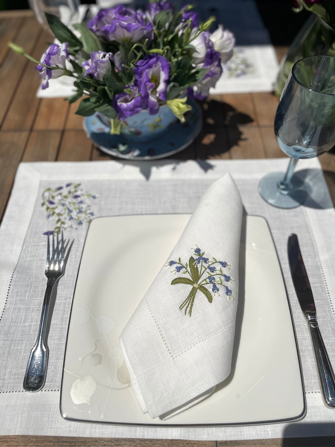 The Botanica Embroidered Bordeaux Placemat and Napkin Set