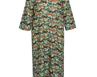May include: A long, button-down dress with a horse pattern in shades of brown, green, and tan. The dress has a collared neckline and three-quarter sleeves. The fabric appears to be lightweight.