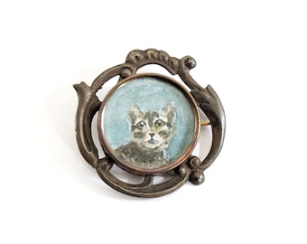 Antique photo brooch with cat portrait