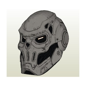 Puede incluir: Un casco futurista gris y negro con un diseño de calavera. El casco tiene una visera con luces naranjas brillantes y un panel lateral con un detalle circular.