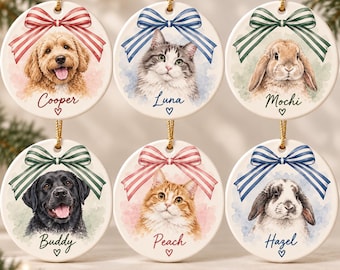 May include: Six round white ceramic ornaments featuring watercolor illustrations of pets. Each ornament displays a dog, cat, or rabbit topped with a striped bow and a name: Cooper, Luna, Mochi, Buddy, Peach, and Hazel, each with a small heart.