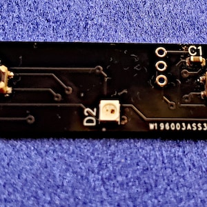 Interruptor subyacente de la tarjeta de abrazadera del sable de luz con acentos Neopixel