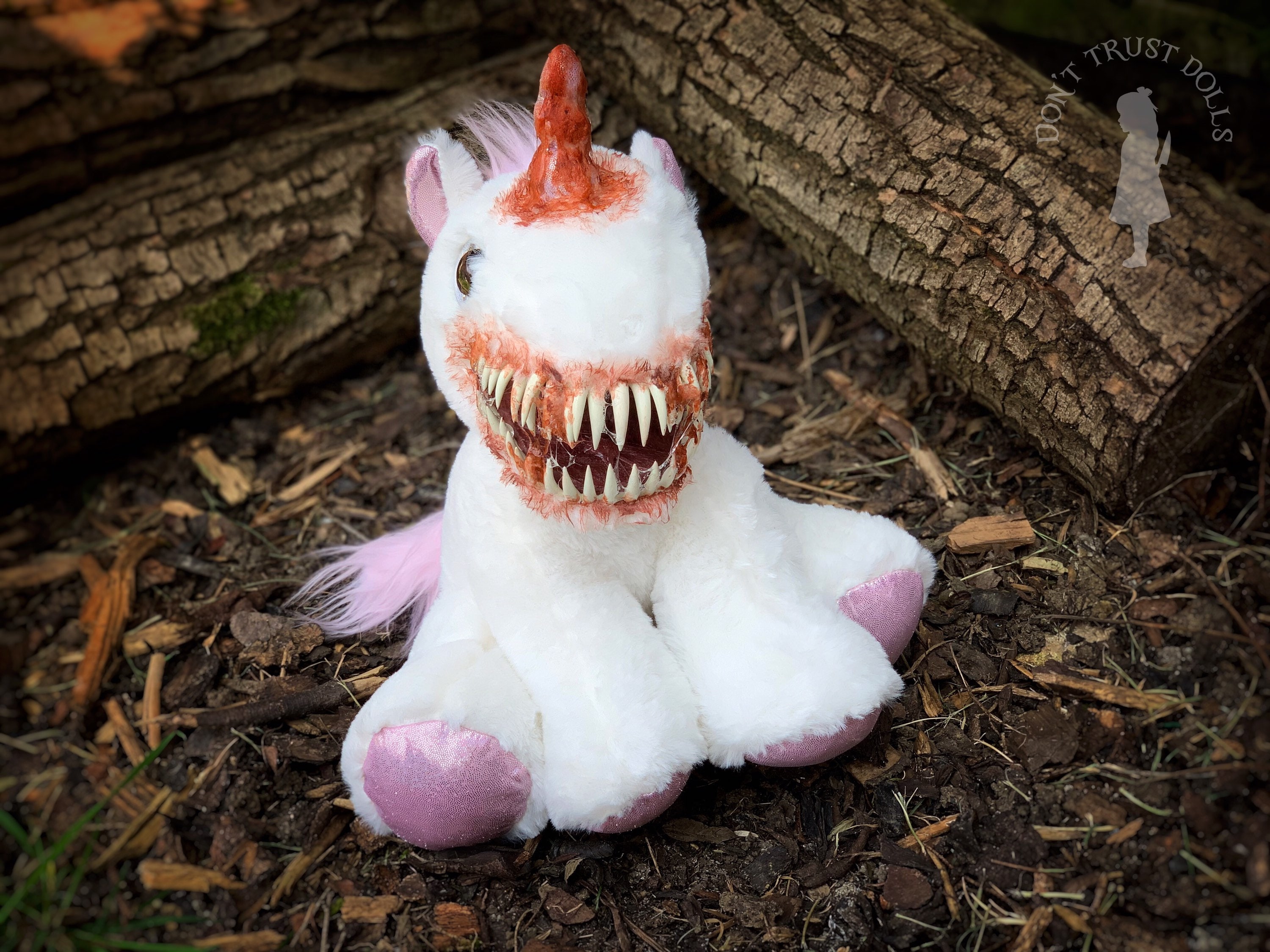 Scary sales unicorn teddy
