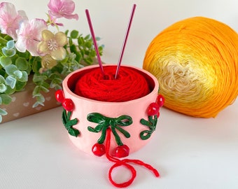 Small cherry with bow crochet pink yarn bowl Coquette crochet yarn holder Handmade clay knitting bowl for yarn Cute mom gifts from daughter