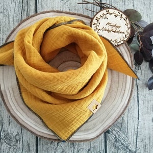 Muslin scarf for babies and toddlers in mustard yellow 50 x 50 cm can be worn from 5 months to 4 years