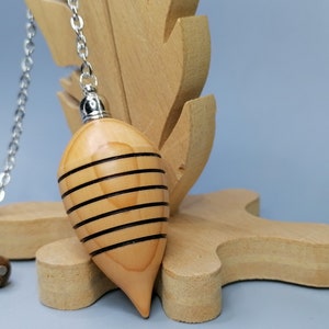 Dowsing pendulum in yew wood, dowsing pendulum, divinatory pendulum