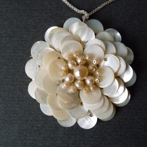 Mother of pearl flower pendant with silver chain