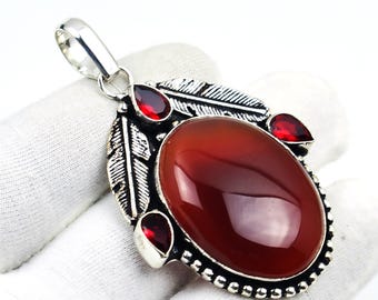 Handgemaakte boho sterlingzilveren ketting met carneool en granaatblad