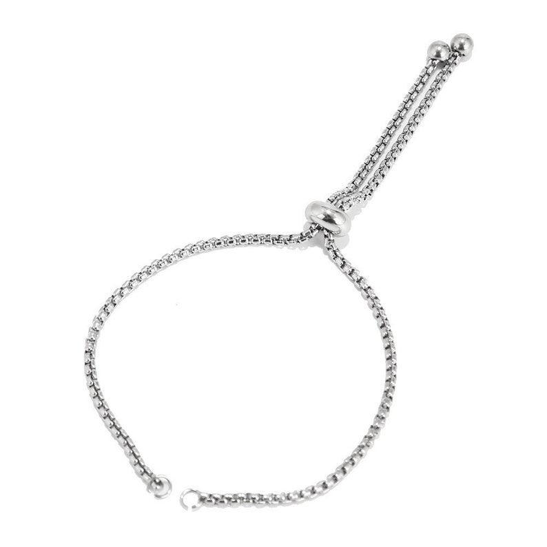 May include: A silver chain bracelet with a sliding clasp. The bracelet is adjustable and can be worn at different lengths.