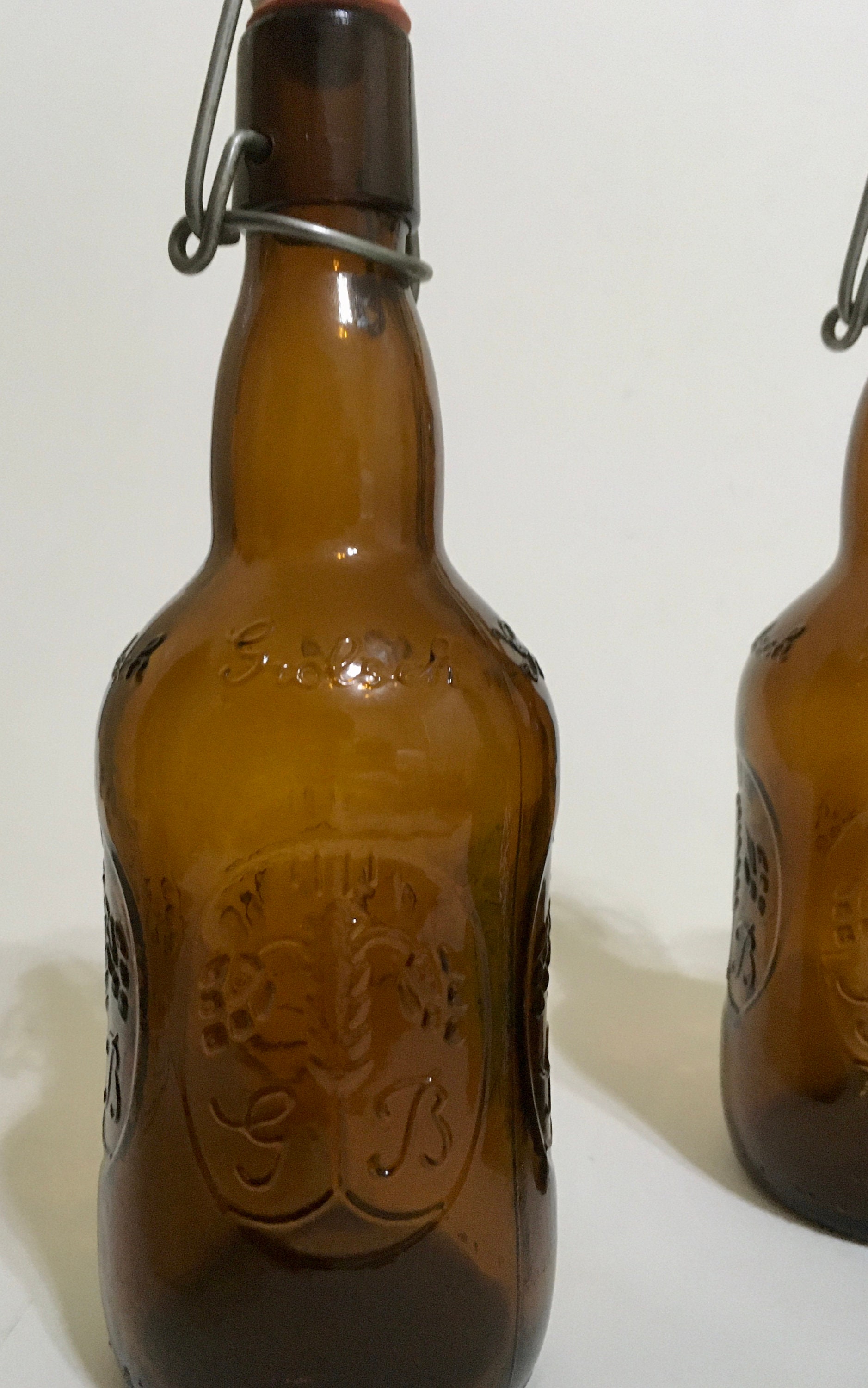 Vintage Grolsch Beer Bottles with Flip Top Lids 3 Brown and 1 Green