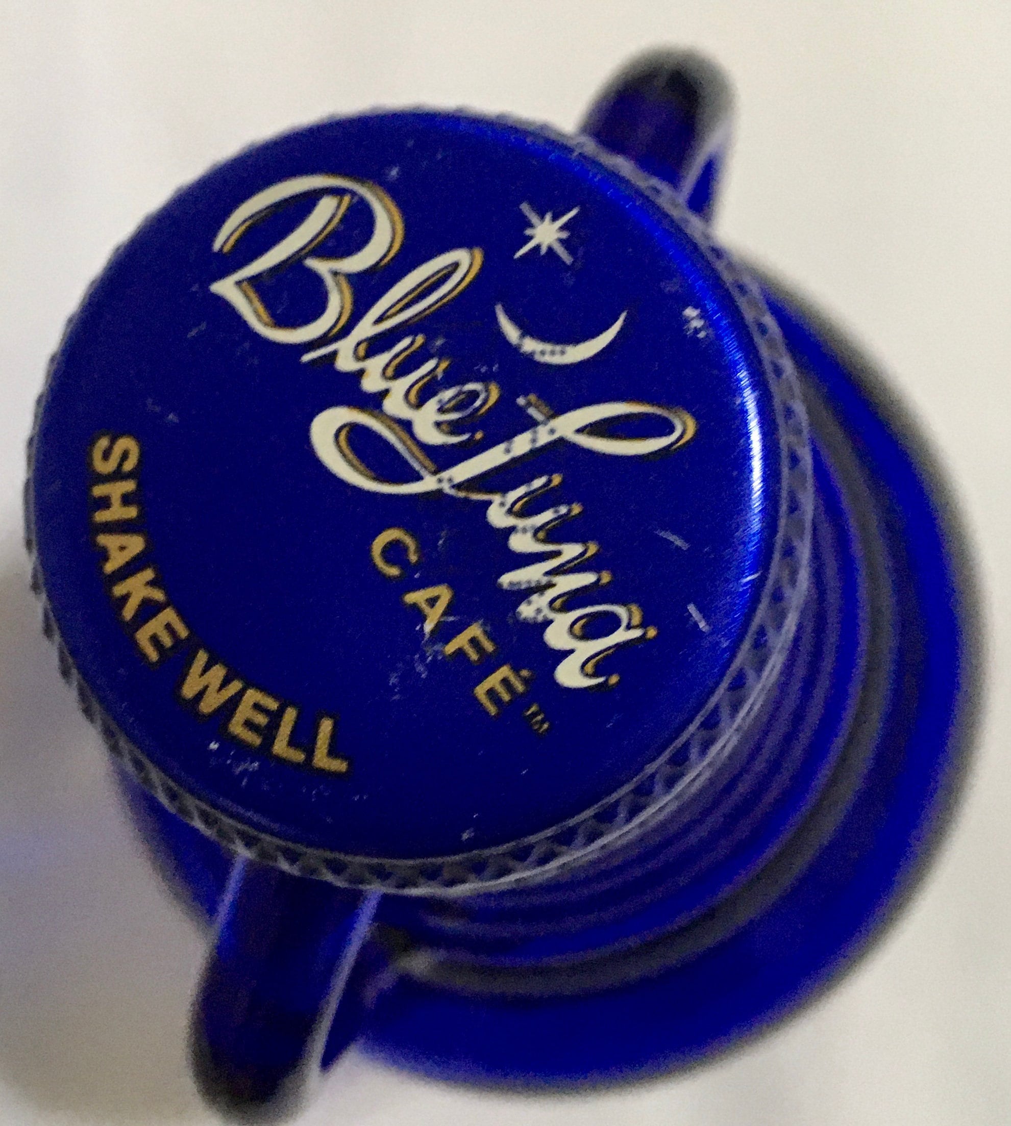 Cobalt Blue Glass Bottle with Double Handle and Metal Lid Blue Luna Cafe