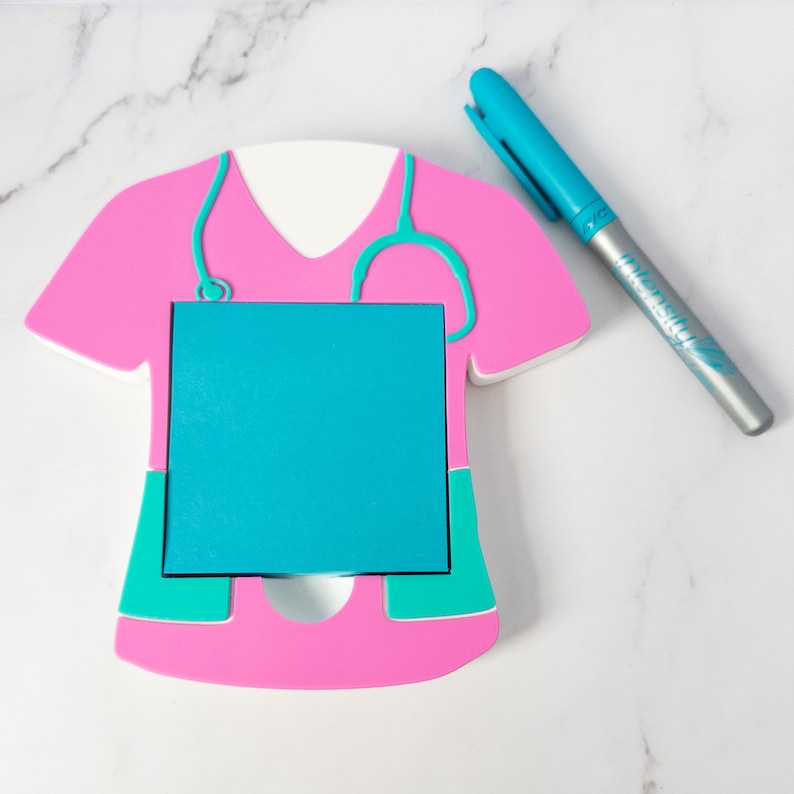 Nurse Sticky Holder Medical Note Organizer Desk Accessory Stethoscope Detail Design Pink Teal Colors PLA Filament Construction Scrub Top Shape Standard Note Size Medical Office Supply Healthcare Professional Gift Perfect Present Nursing