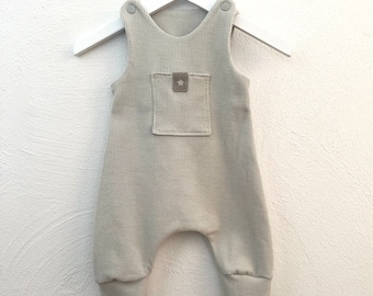 Baby Strampler creme mit Tasche