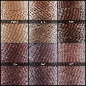 May include: Six spools of thread in various shades of brown. The spools are labeled with the following numbers: Palha, 612, 649, 259, 207, and 567.