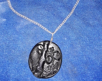 Hand made Dark Green Carved Jade Parrot Pendant on silver toned chain