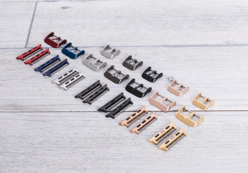 Seven colors of hardware parts of a leather Apple watch band.
