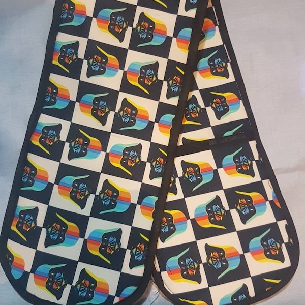 Double oven gloves in cotton print.  Star Wars Darth Vader in black and white with rainbow helmet and black trim. Gifts under 20