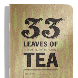 May include: A brown paper journal with the title "33 Leaves of Tea (A Pocket Tea-Tasting Journal)" in black text. The journal has a space to write the date started and the date completed.