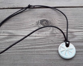 Ceramic necklace "light blue sun"