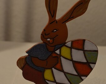 Rabbit with ceramic Easter egg