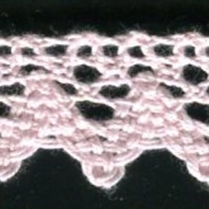 May include: Pink crocheted lace trim with a scalloped edge.