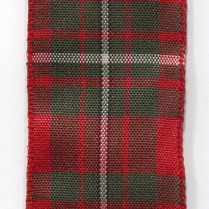 May include: Red, green, and white plaid ribbon with a woven texture.