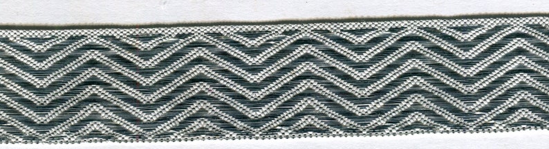By the end of the day Lurexborte zigzag silver 26 mm