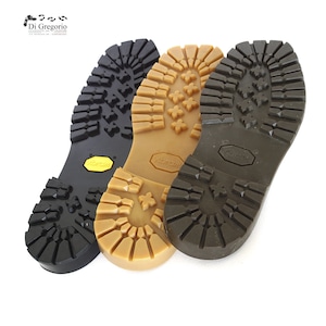 May include: Three different shoe soles, one black, one brown, and one tan. Each sole has a unique tread pattern and the word "Vibram" is printed on each sole.