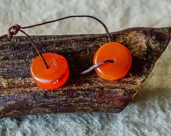 Two Antique Tibetan Pema Raka Carnelian Disk Beads/Two Tibetan Pema Raka Beads