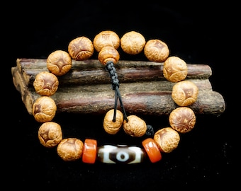 Kylin-Eyed Bodhichitta Bodhi Seed; Replica Three-Eyed Tibetan dZi Bead;  and Pema Raka Carnelian Wrist Mala