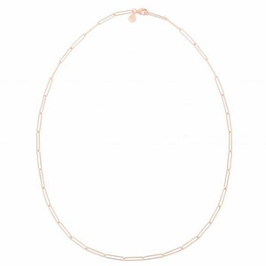 May include: A rose gold chain necklace with a delicate paperclip chain design.
