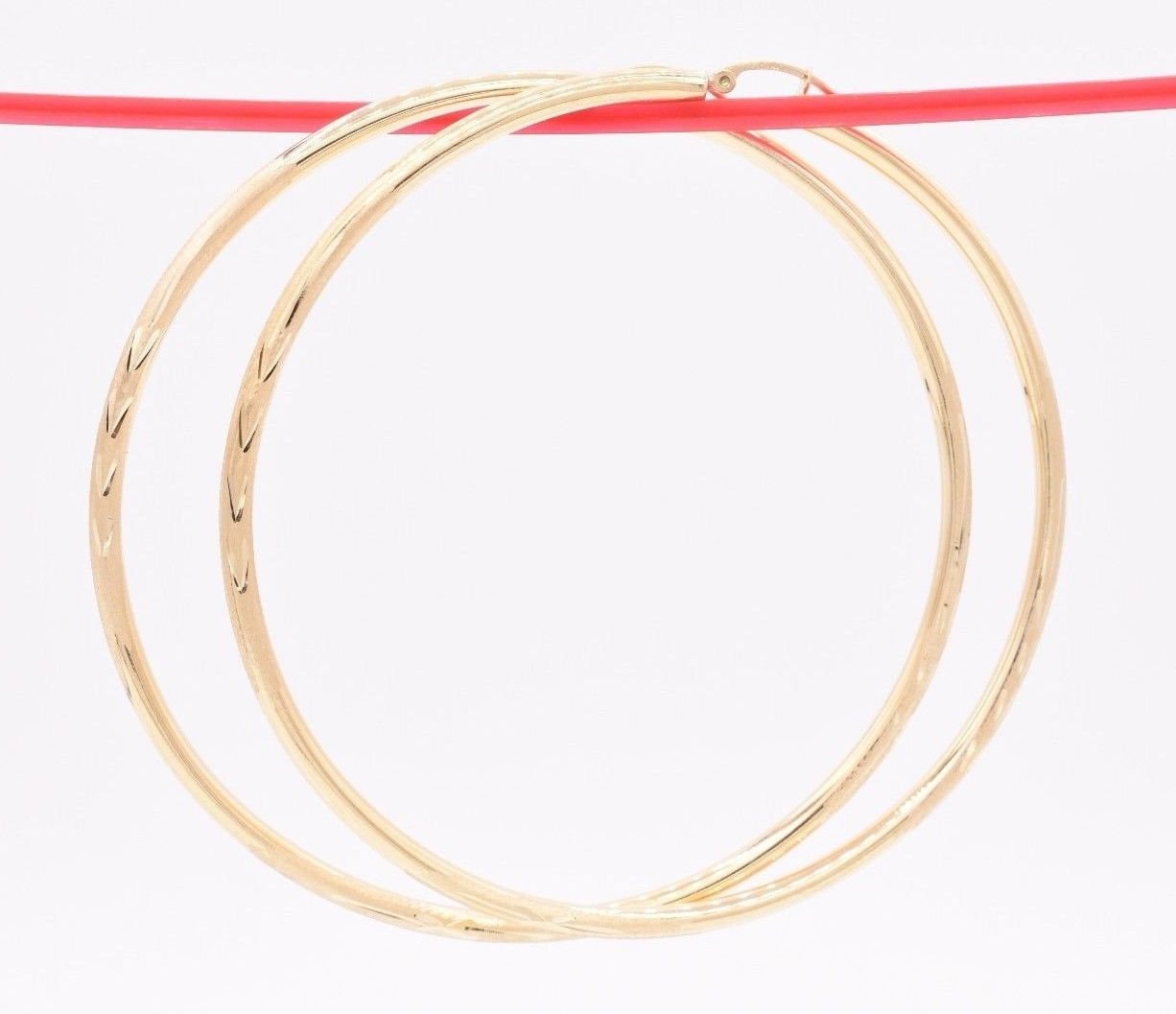 Schöne, Glänzende Creolen Mit Mäander-Muster - Damen-Goldschmuck