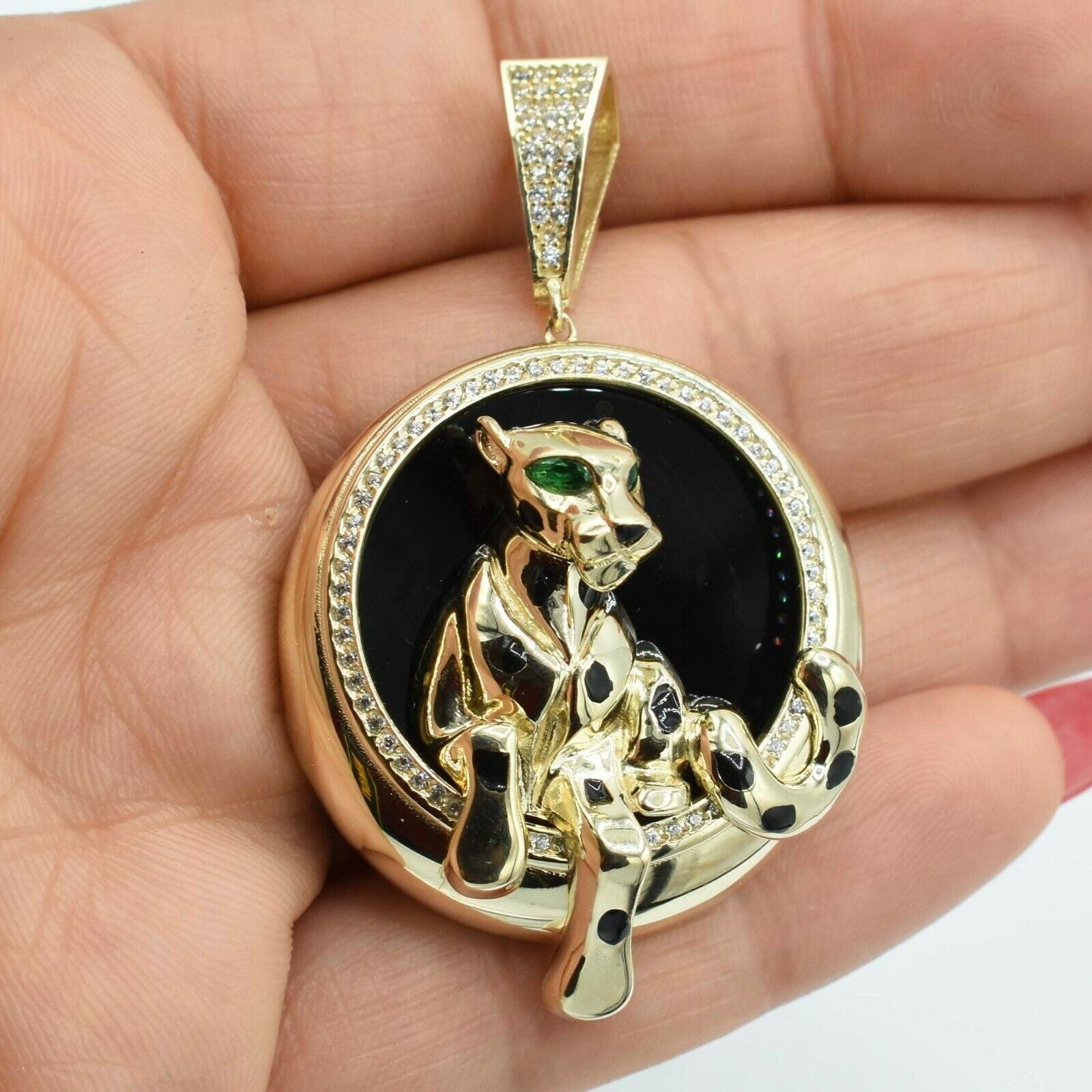 Gold store panther pendant