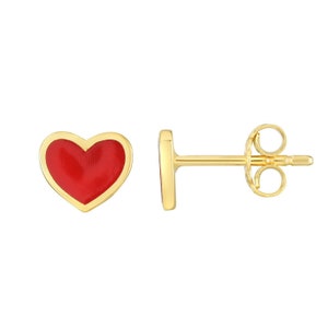 May include: A pair of gold heart-shaped earrings with red enamel. The earrings have a post and butterfly back.