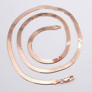Flexibele ketting met visgraatmotief van 4 mm, 14 kt roségoud beklede zilver 925, Italië