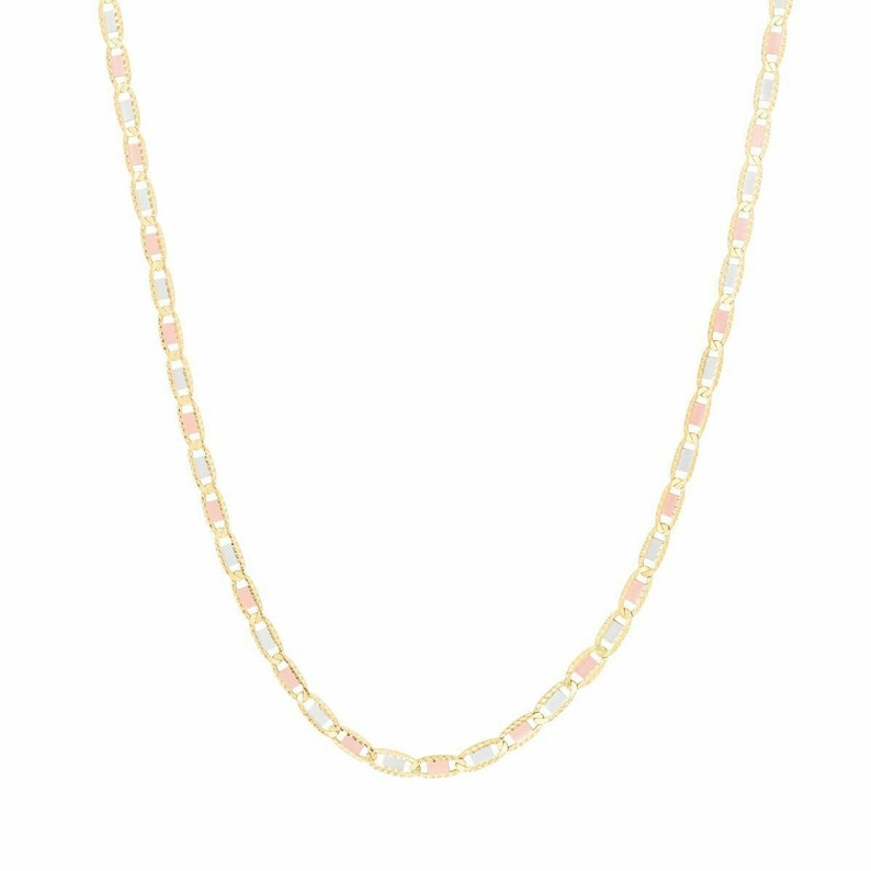 May include: A gold chain necklace with alternating white and pink links.