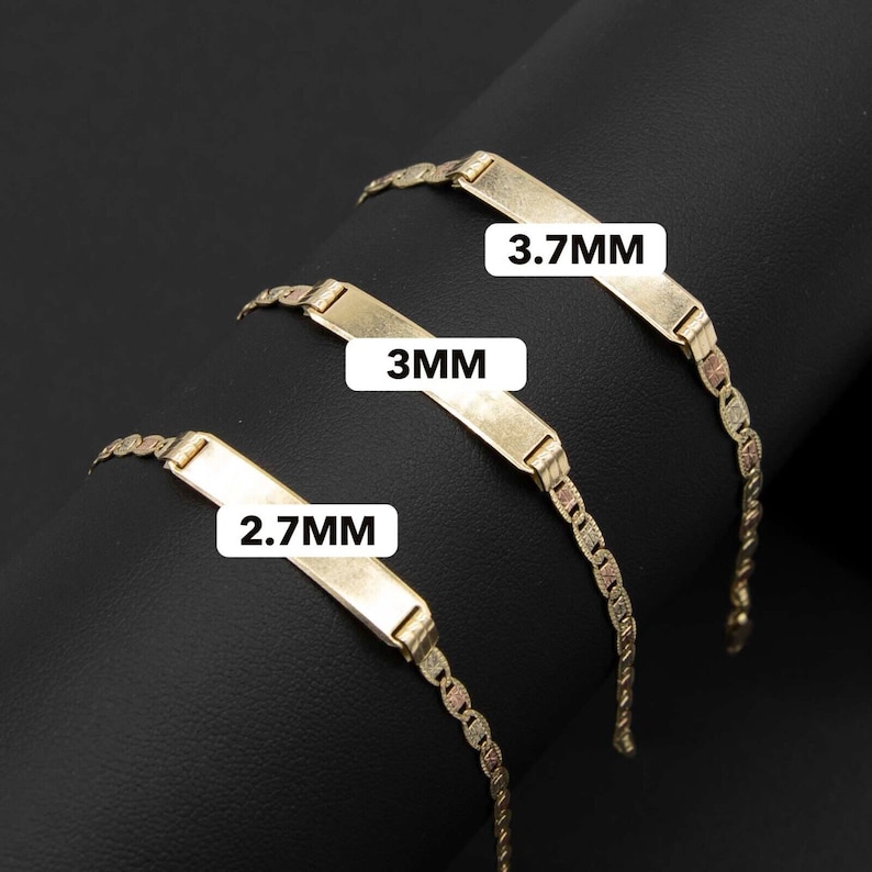 May include: Three gold bracelets with different sized rectangular nameplates. The nameplates are 2.7mm, 3mm, and 3.7mm.