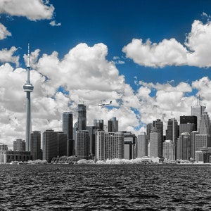 Toronto Skyline, a panoramic view from the Rodgers Centre (SkyDome) and CN Tower to the Financial District, as seen from the Toronto Islands