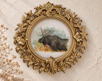 Sömnig älg — Rund inramad tavla
