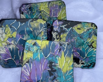 Multicolored abstract botanical and resin coaster set