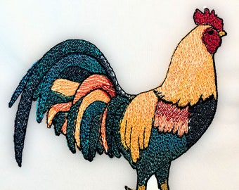 May include: Embroidered rooster patch with a blue, green, orange, and red color scheme. The rooster is standing with its tail feathers fanned out.