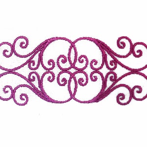 May include: A pink embroidered design with a swirling pattern. The design is made up of multiple loops and curves.