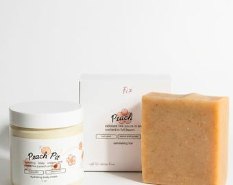 Set de jabón exfoliante y crema corporal de hueso de melocotón: cuidado hidratante para pieles con textura irregular.