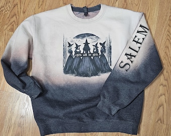 May include: A white and gray sweatshirt with a black and white graphic of four witches with the text "girls will be girls" and the word "SALEM" on the sleeve.