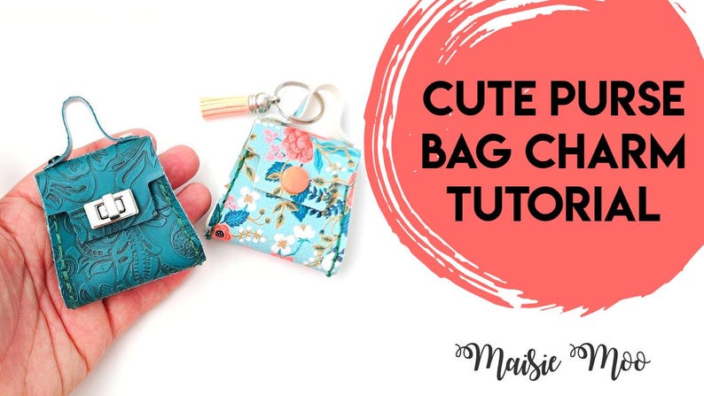 May include: Two miniature purse bag charms. One is teal with a silver clasp, the other is floral print with a button closure. The image includes the text "CUTE PURSE BAG CHARM TUTORIAL".