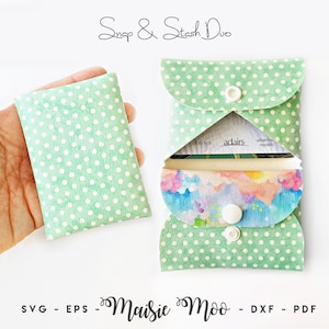 May include: A light green pouch with a white polka dot pattern and a white snap closure. The pouch is shown closed and open, revealing a colorful watercolor-style interior lining. The text "Snap & Stash Duo" and "Maisie Moo - SVG - EPS - DXF - PDF" appear.