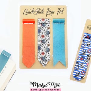 May include: A set of QuickSlide Page Pal bookmarks on a display card, including solid orange, solid teal, and swallow-patterned faux leather strips. A separate blue-and-white striped bookmark with nautical motifs is shown on a separate card.