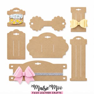 May include: A collection of brown kraft paper display cards for accessories, including various shapes and sizes with slots for hair clips and bows. Some cards hold hair clips with floral and lemon patterns, a yellow bow, and a pink bow on a silver band. Text reads Maisie Moo FAUX LEATHER CRAFTS.