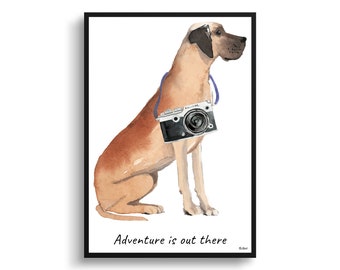 May include: Watercolor painting of a tan dog with a black and white camera hanging around its neck. The dog is sitting, facing right, with the text "Adventure is out there" at the bottom. The artwork is framed in a black border.