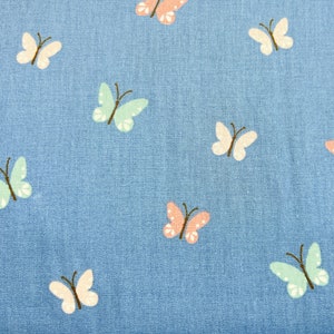 Cotton fabric with butterflies poplin in mint, blue, pink and mauve / red / burgundy BLAU